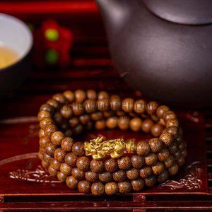 Agarwood Bracelet 108 beads With Pixiu Golden Charm